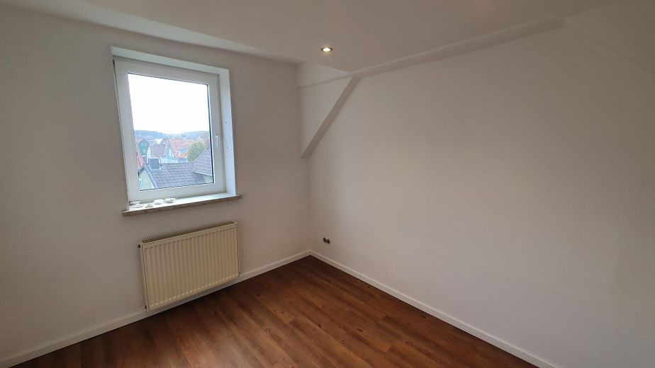 Accogliente appartamento monolocale (ca. 35 m²) vicino all’università – posizione tranquilla, con cucina componibile – Schlafzimmer