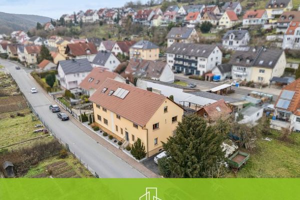 Solides Zweifamilienhaus im Würzburger Einzugsgebiet – viel Wohnraum, flexible Nutzung, Doppelgarage