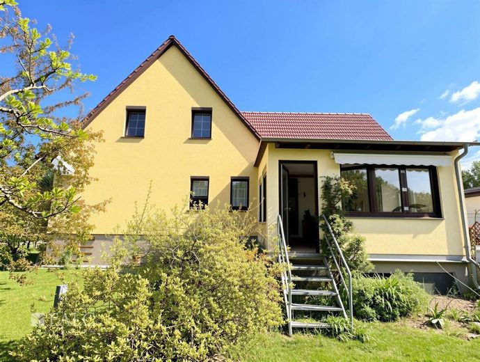 Energieeffizienzhaus A - provisionsfrei - Angebotspreis 61.000 EUR unter Verkehrswertgutachten – Rückseite mit Wintergarten