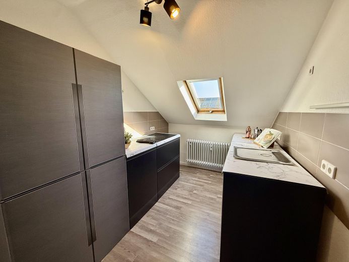 Eigentumswohnung im Dachgeschoss mit zwei Außenstellplätzen in Speyer – Kochen