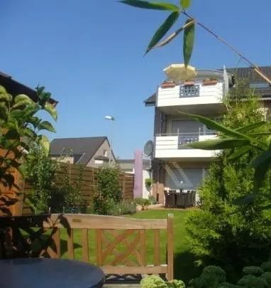 TOP 3,5-Zimmer Wohnung im 1. OG – Gartenansicht