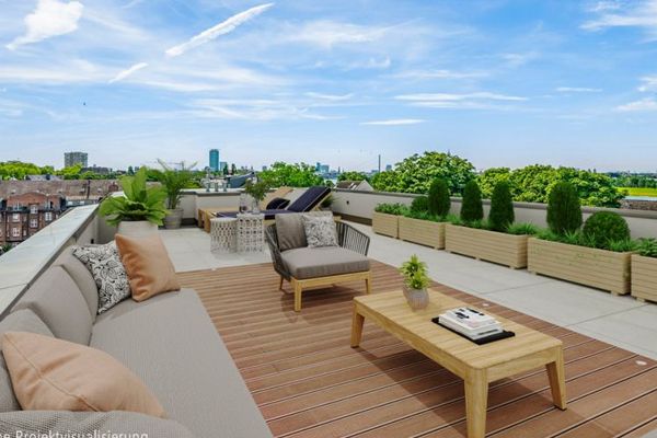 Yaklaşık 260 m² üzerinde nefes kesen çatı terası ve Ren manzarasıyla lüks yaşam