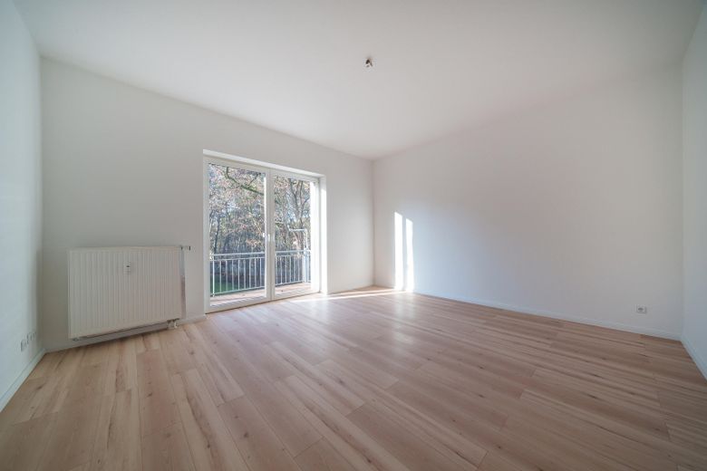 Lichtrijk 3-kamerappartement, ca. 96 m², met groot zonnig balkon in het groen – Wohnzimmer