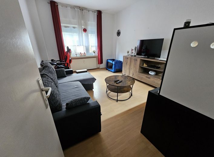 5.5% से अधिक प्रतिफल के साथ Köln Mühlheim में आकर्षक निवेश – Wohnzimmer 2