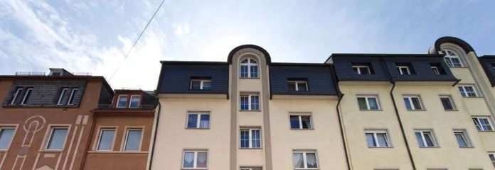 Affascinante appartamento duplex mansardato di 4 locali con balcone e giardino