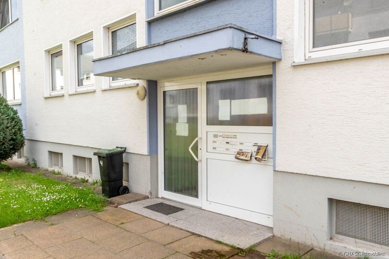Helle 5-Zimmer-Eigentumswohnung im 1. OG - Wohnen oder Vermieten in Hameln/Hastenbeck! – Hauseingang