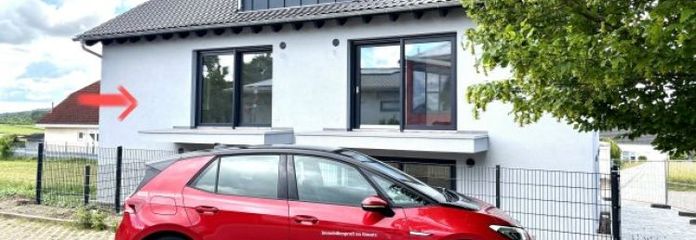 Neubau: 3-Zimmer, Ortsrandlage, Erstbezug mit Balkon und Stellplätzen