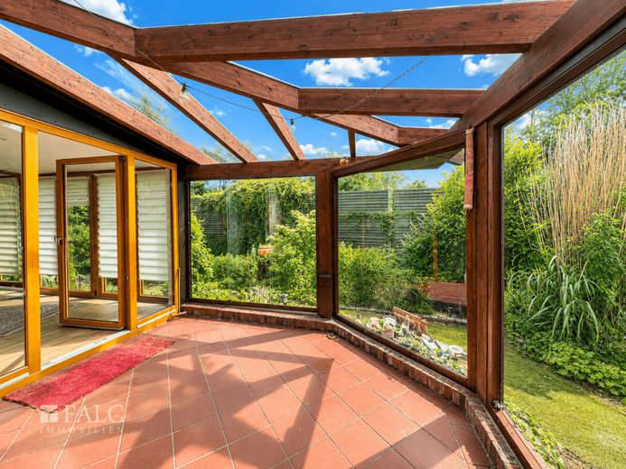 Gartenidylle mit Wintergarten-charmantes Einfamilienhaus zum Wohlfühlen in der Nähe von Langen – Wintergarten, Eingang zur Wohnküche