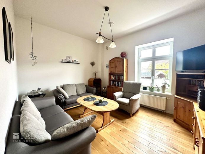 Top Eigentumswohnung mit Garten und eigenem Eingang in Stade Ottenbeck – Wohnzimmer