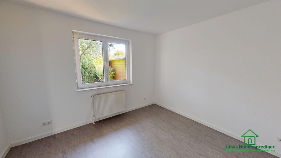 Einfamilienhaus mit Carport und Garten – Foto 2