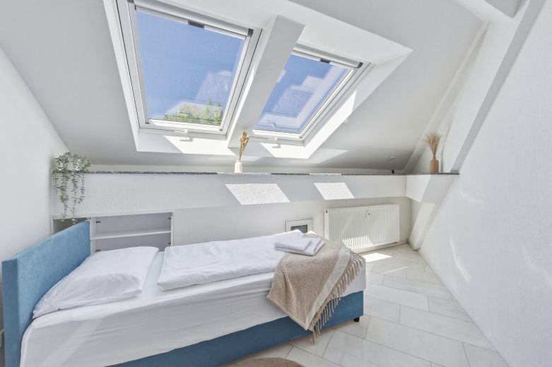 Charmante 4,5-Zimmer Dachgeschosswohnung – Schlafzimmer 2