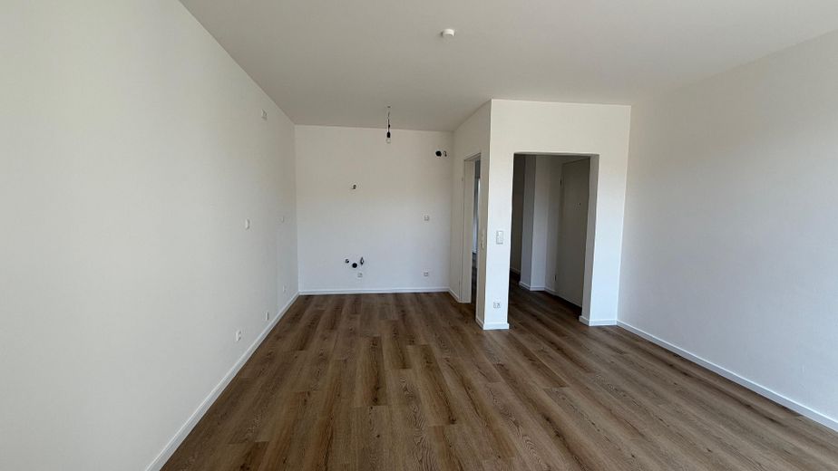 Erstbezug nach Sanierung im Herzen von Unterhaching – Wohnzimmer / Küche