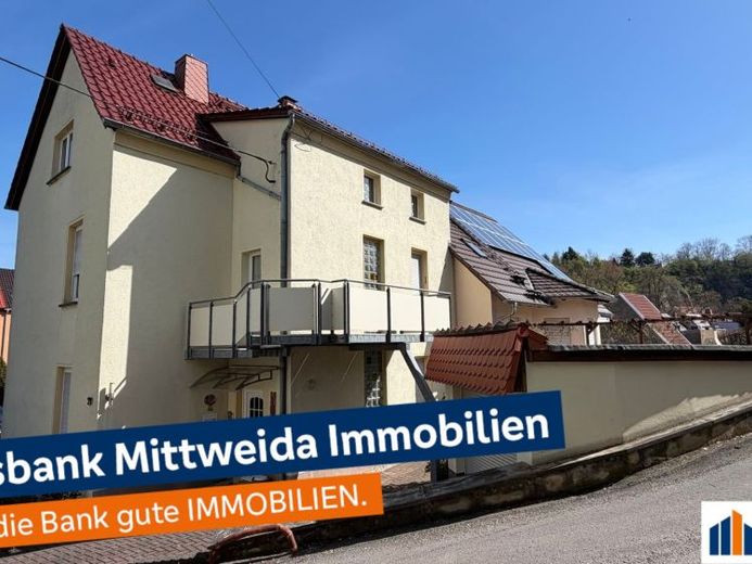 Gepflegtes Einfamilienhaus mit zwei Wohneinheiten und Ausbaupotenzial in Lunzenau – Foto 1