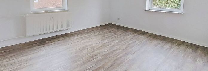 Moderne 3-Zimmer-Wohnung mit EBK und Wannenbad – Ansicht I: Wohn- und Esszimmer