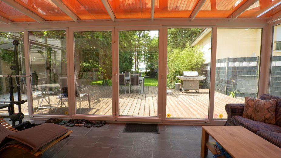 Auf Zeit: Traumhaus am See mit eigenem Steg, nur 30min von Berlin-Mitte – Wintergarten mit Seeblick