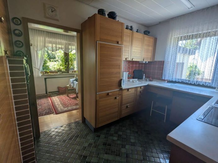 Einfamilienhaus mit Einliegerwohnung und idyllischem Garten in toller Lage, provisionsfrei – Küche EG