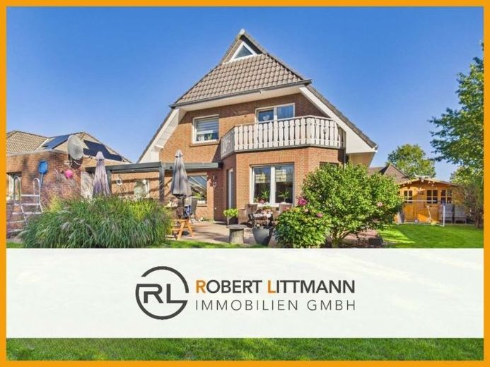 Attenzione, famiglie: casa unifamiliare ben tenuta con 6 locali e ampio giardino – Foto 1