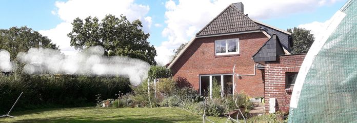 repräsentatives Zweifamilienhaus – Gartenansicht aufs Haus