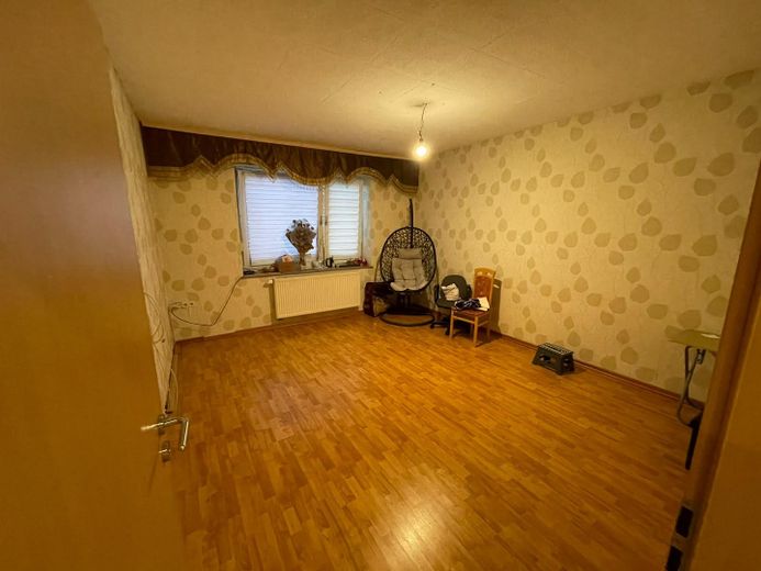 Wohn- und Geschäftshaus mit Ladenfläche, Nebengebäude, Garagen&Ausbaupotenzial in Nordkirchen-VHB – Wohnzimmer