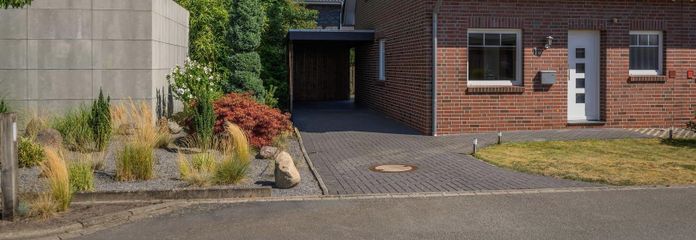 Young semi-detached house with carport in Friedrichsfehn – Hausansicht