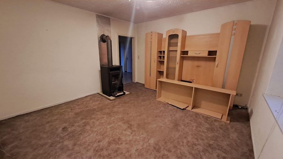 Wohnzimmer mit Kamin