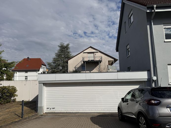 Wohnung Erdgeschoss mit Terrasse – 3er-Garage