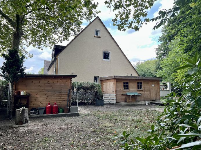 Половина будинку гірничого селища, Ессен-Край – Seitenansicht vom Garten