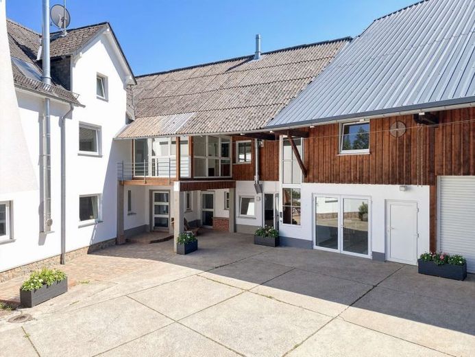 Zweifamilienhaus mit Gewerbe (KFZ Werkstatt) – Foto 1