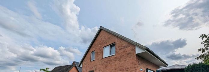 Posizione tranquilla, grande potenziale – una porzione di casa bifamiliare che aspettava proprio Lei