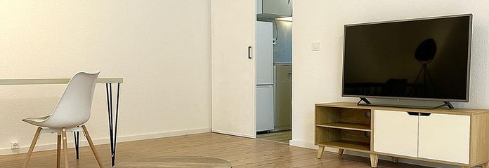 🌟 Bilocale ristrutturato e arredato di prima qualità con cucina componibile e garage sotterraneo – Wohnzimmer.