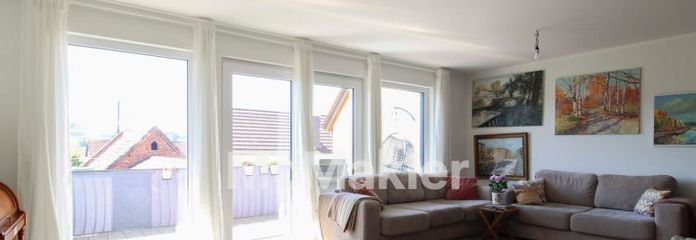 Neuwertige Etagenwohnung mit Balkon, 2 Carport - Stellplätzen & Wärmepumpe – Wohnkomfort in Goldbach