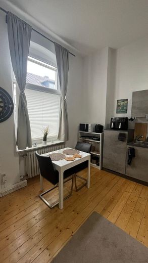 Charmante 1-Zimmer-Altbauwohnung direkt am Kurpark in Bad Oeynhausen – Wohnbereich