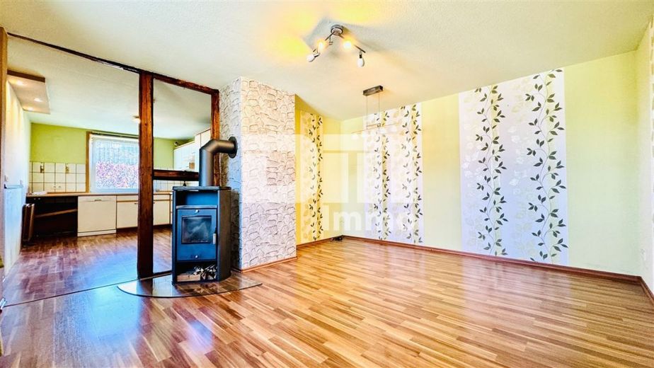(R)eserviert!Charmanter Wohntraum mit Tradition und Weitblick – OG Wohn / Esszimmer offen / Kamin
