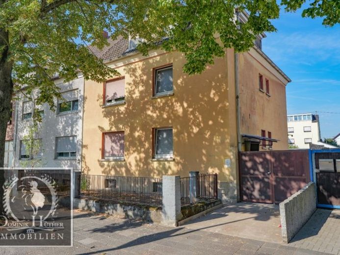 Casa de 3 familias en Ludwigshafen-Oppau | 3 viviendas, 3 garajes y potencial de desarrollo – Foto 1