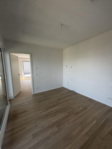 Prima occupazione | Appartamento di nuova costruzione con 2 locali, terrazza sul tetto e vista sulle Alpi – Schlafzimmer 1