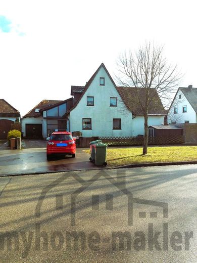Hier stecken viele Optionen für Sie drin - Doppelhaushälfte mit Garten und Erweiterungsmöglichkeiten – Hausansicht Westen