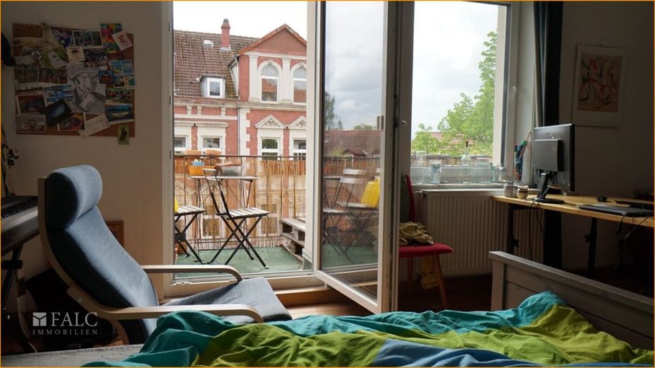 Ein Zimmer mit Balkon