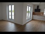 Neubau - Penthouse -  Fahrstuhl - Barrierefrei - TG-Stellplätze – Blick auf Küche und Wohnzimmer