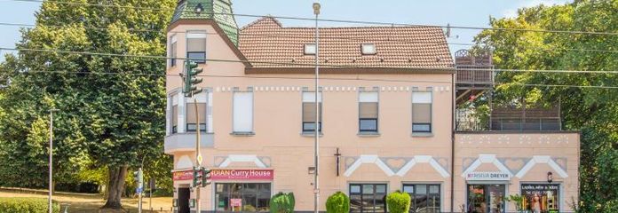 Mixed-use residential and commercial building approx. 481 m² with three residential and three commercial units in Mülheim-Altstadt II