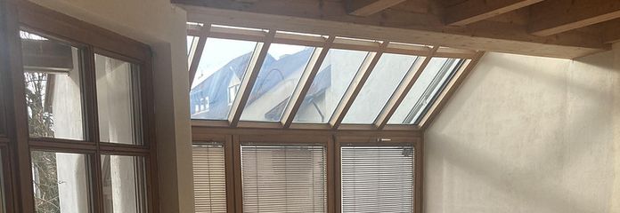 Wohnzimmer mit Wintergarten