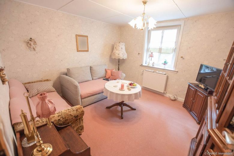 Zentrales 7-Parteien-Mehrfamilienhaus in der Hamelner Innenstadt - Historisch &amp; Rentabel vermieten! – Wohnzimmer OG R