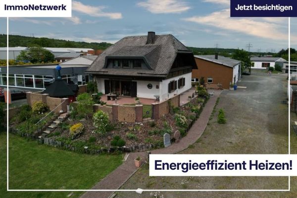 Einfamilienhaus mit toller Gartenanlage und vielseitig nutzbarer Lagerhalle im Gewerbegebiet