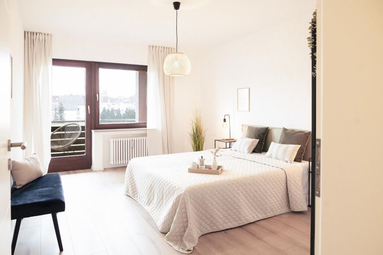 Schlafzimmer mit Balkon