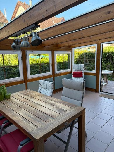 Eigentumswohnung mit Wintergarten, Terrasse und Garten – Wintergarten