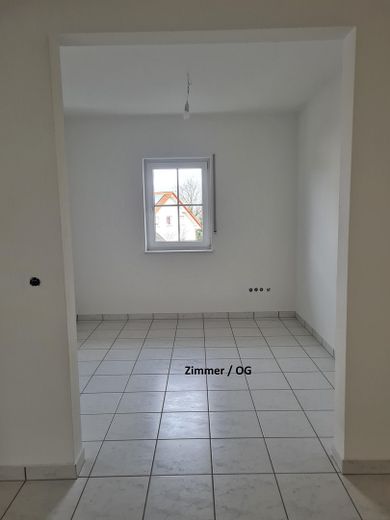 Exclusive maisonette apartment in Beckerswäldchen – Zimmer EG