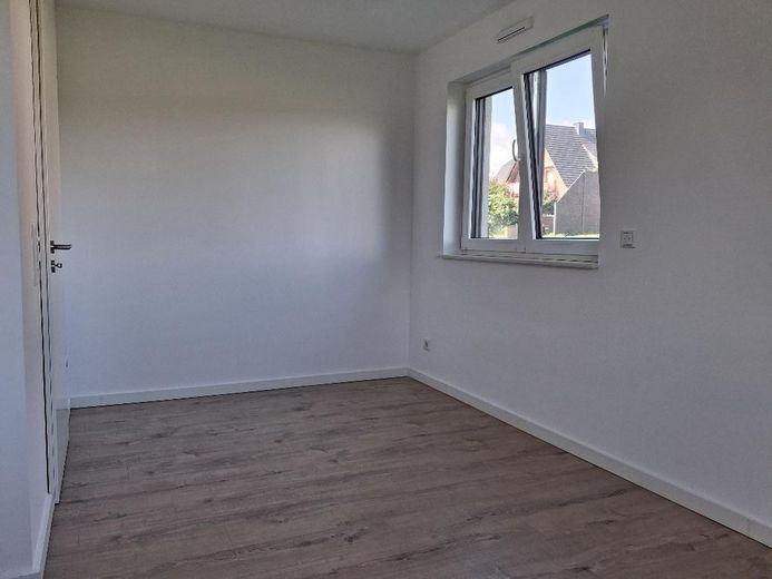 Moderne 3-Zimmer-Erdgeschosswohnung mit Terrasse und Carport in Bad Oeynhausen-Werste – Schlafzimmer