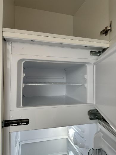 Bright 2-room attic apartment with fitted kitchen in a central location – Küche