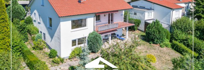 Premiumlage trifft Potenzial – Großzügiges 1- 3 Parteienhaus mit traumhafter Aussicht