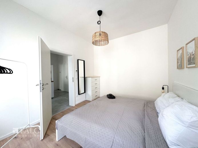 Mehrfamilienhaus-12 Wohnungen-Energieklasse A – Schlafzimmer