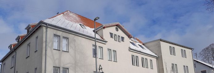 Ruim 3,5-kamerappartement met balkon, tuin en parkeerplaats